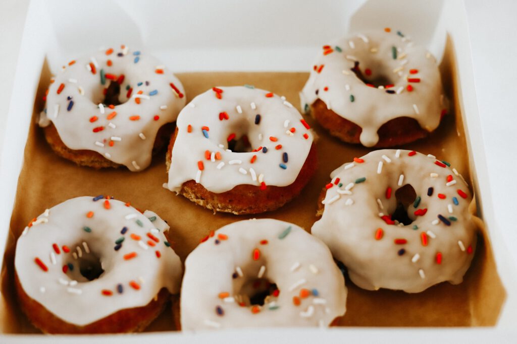 Box of birthday cake donuts from chalk to flour bend dessert delivery