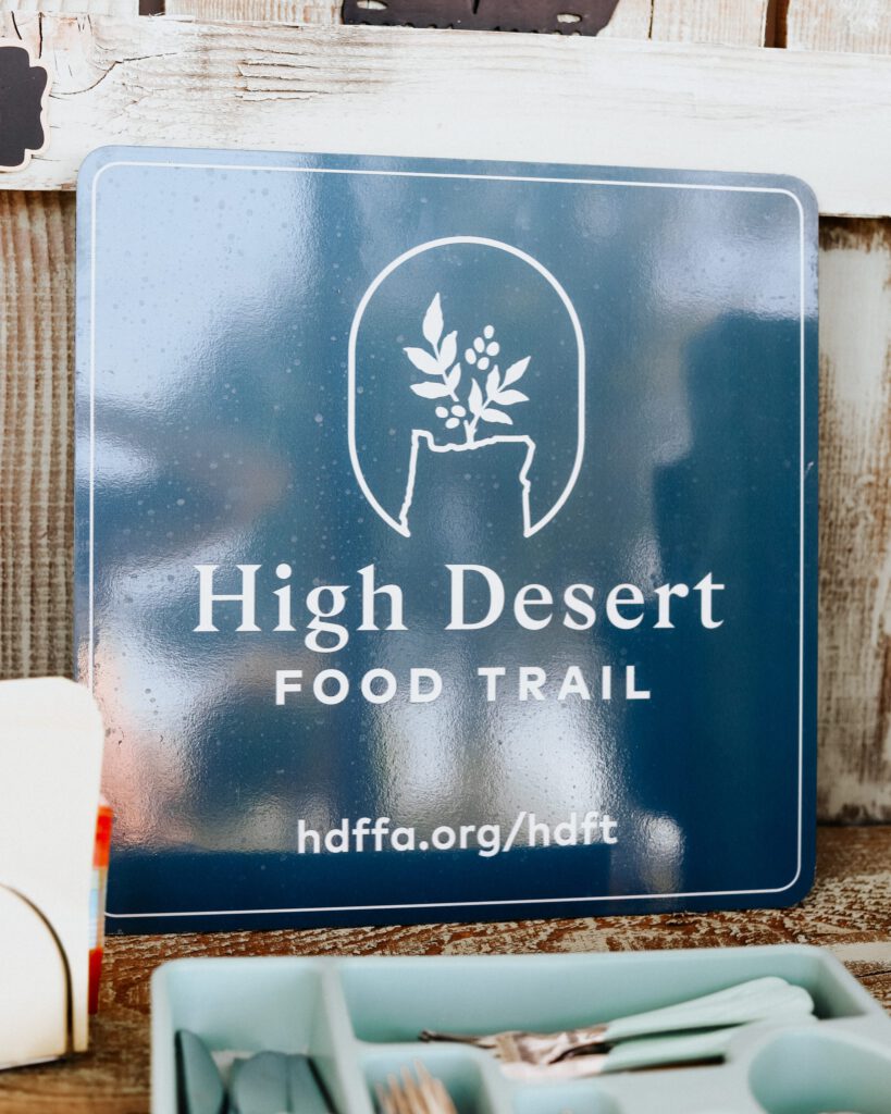 Blue sign reads High Desert Food Trail