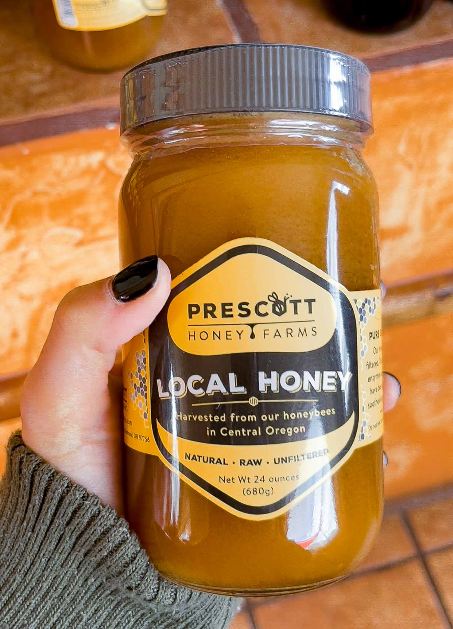 jar of honey reads "local honey from central oregon" from prescott honey farms in remdond, oregon