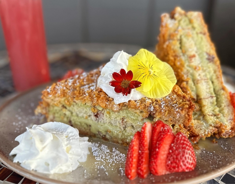 fried french toast garnished with a flower