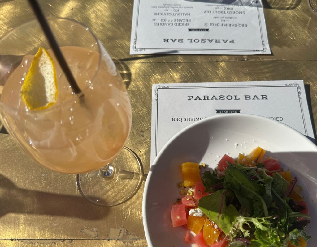 drinks and salad at parasol bar